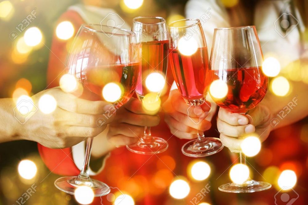 88896377-group-of-hands-toasting-glasses-of-red-wine-for-christmas-or-xmas-celebrating-party-closeup-photo-wi.jpg