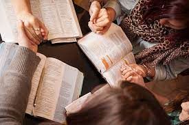 bible study group. holding hads in prayer.jpg