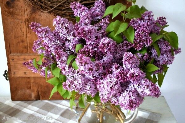 Rustic-Spring-Vignette-featuring-a-Fresh-Lilacs-Bouquet-AnExtraordinaryDay.net_.jpg